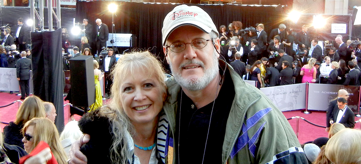 image of woman and man at conference